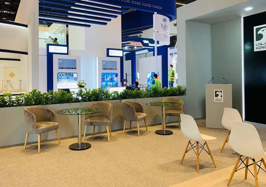 Executive meeting spaces integrated into the premium ADNOC exhibition environment