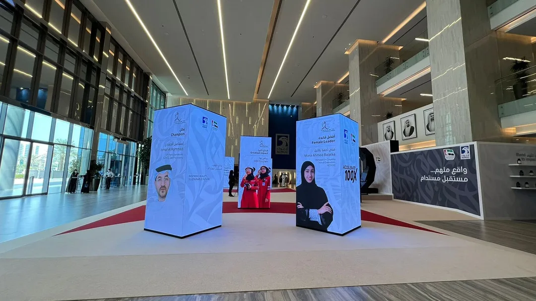 Interactive art gallery displaying works by local female artists on custom plinths
