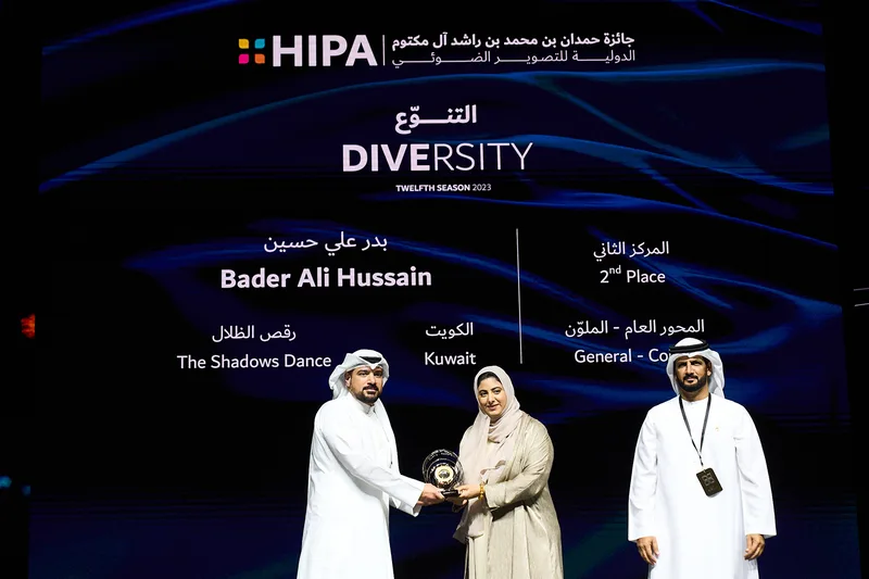Photography awards presentation stage featuring high-resolution LED backdrop and awards podium in Dubai