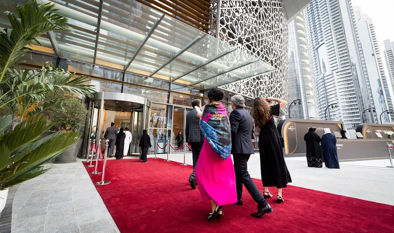 HIPA award ceremony guests arriving along the red carpet beside the branded registration area