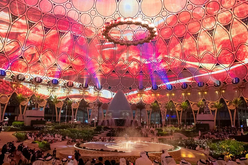 Live closing ceremony production featuring the iconic gold rain curtain above the audience