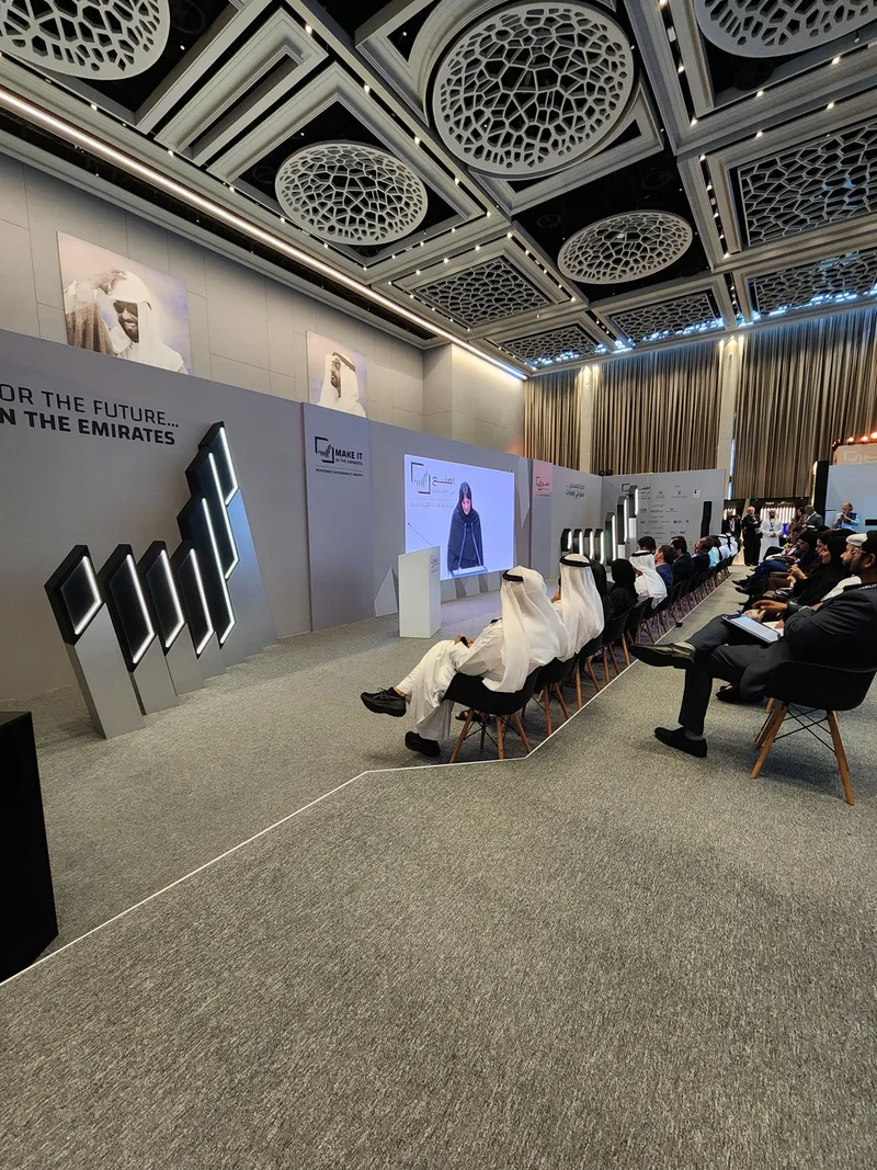 High-resolution LED video wall displaying industrial growth metrics and supply chain strategy