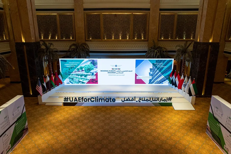 Minimalist climate conference stage set with high-resolution LED backdrop screens