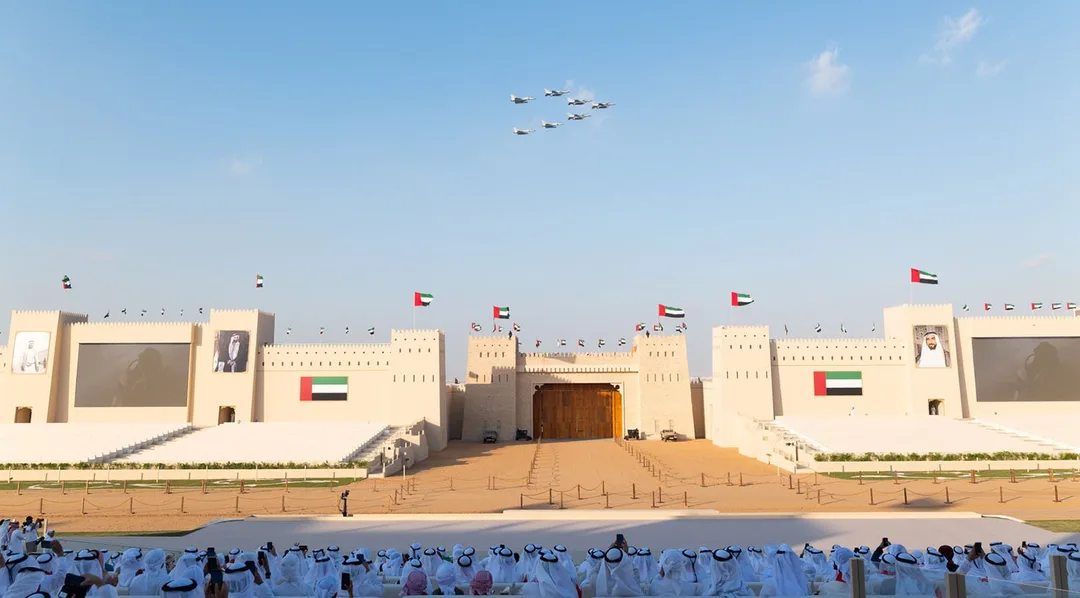 Three grandstands, 120 tribal compounds and site-wide services organised as one national landscape celebrating unity, heritage and participation.